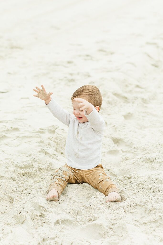 tips for successful family beach photos emerald isle beach little boy playing in sand