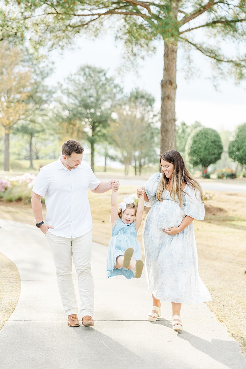 maternity photos with toddler and parents