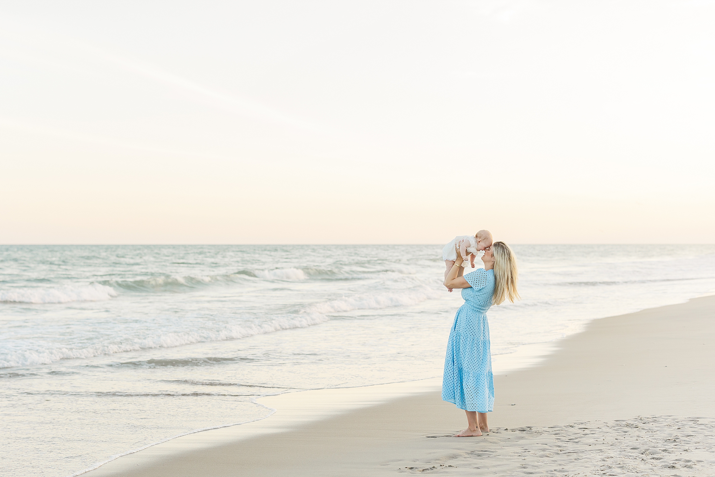 extended family photos six month old baby with mom at sunset nc beach atlantic