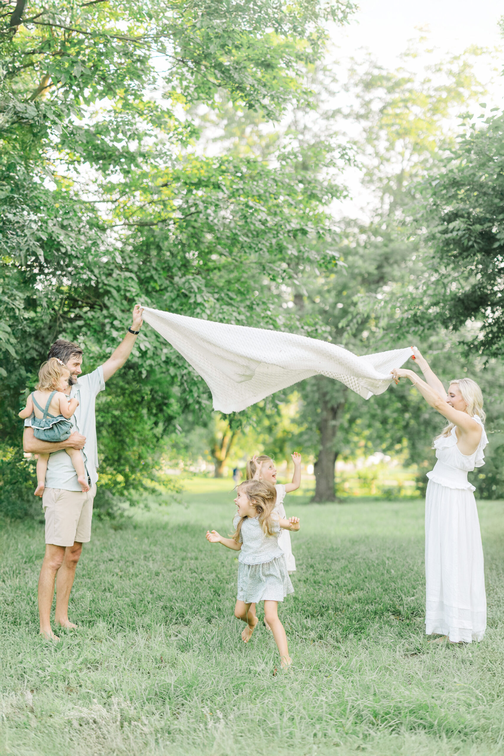 family playing games for pictures with storytelling connection